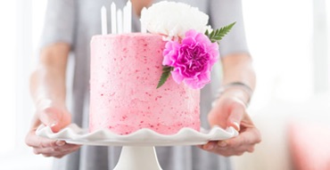 Pink cake decorated with flowers